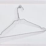 ART COMPASS - Rene Wirths - 85 Kleiderbügel am Haken - 2014