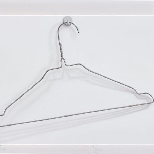 ART COMPASS - Rene Wirths - 85 Kleiderbügel am Haken - 2014